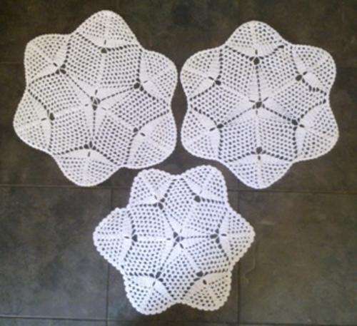 Three lacy large cotton crochet doilies