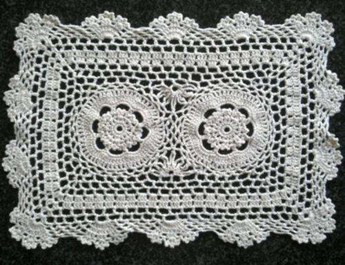 Different cream crochet cotton doilie