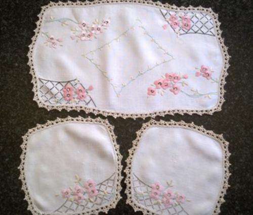 Lovely vintage hand embroidered three piece dresser set with pink blossoms