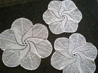 Three white cotton pinwheel doilies - 32cm, 28cm & 26cm