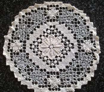 Three lovely hand knotted lace doilies