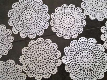 One dozen dainty crochet cotton doilies