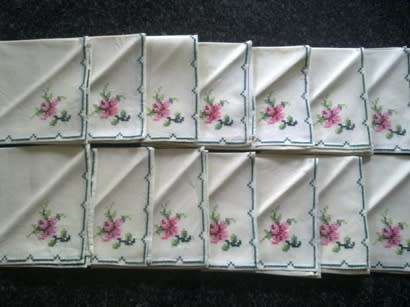 Fourteen embroidered lunch napkins