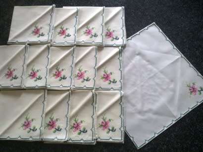 Fourteen embroidered lunch napkins