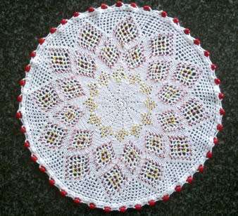 Large vintage glass beaded doilie with red and yellow seed beads