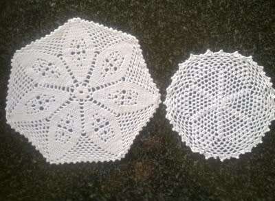 Two white crochet doilies 23cm & 17cm