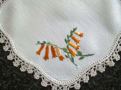 Pretty pair of hand embroidered linen doilies 20cm