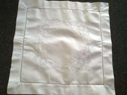 Crisp white cotton hand embroidered cushion cover