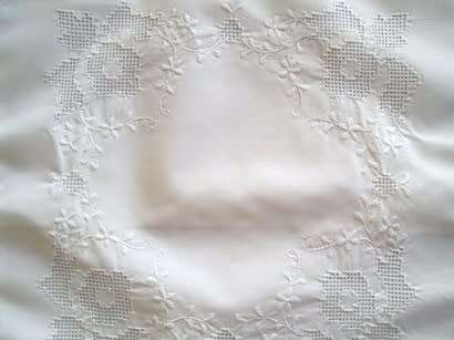Crisp white cotton hand embroidered cushion cover