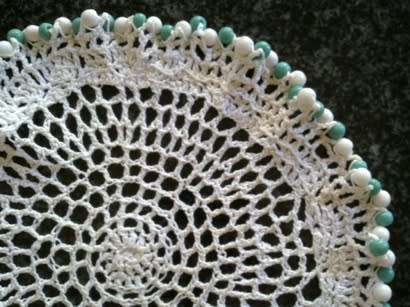Lacy vintage glass beaded doilie 18cm