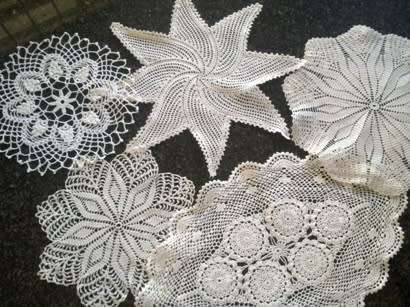 Collection of five cotton crochet doilies