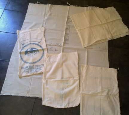 Three vintage flour sacks & fabric pieces