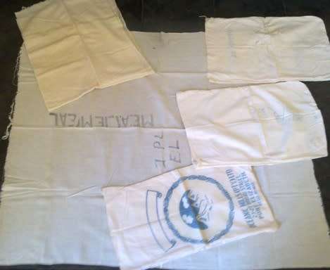 Three vintage flour sacks & fabric pieces