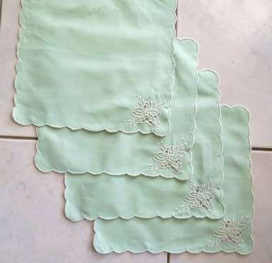 Four vintage mint green cotton napkins