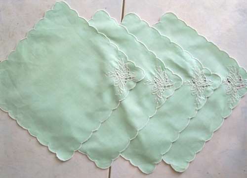 Four vintage mint green cotton napkins