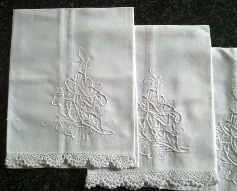Five vintage white cotton guest hand towels