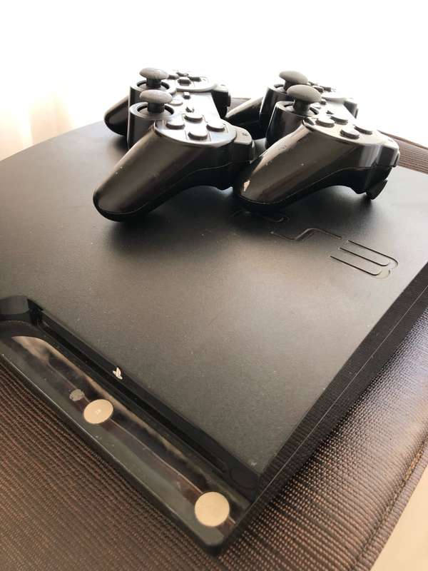 ***Selling as non-functional*** SONY PS3 MODEL CECH-2004B and two ORIGINAL SONY PS3 WIRELESS CONTROL