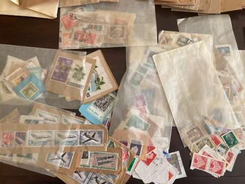 BULKLOT SALE - Box full of world mixture on/off paper, plus old schoolboys books, lots of covers
