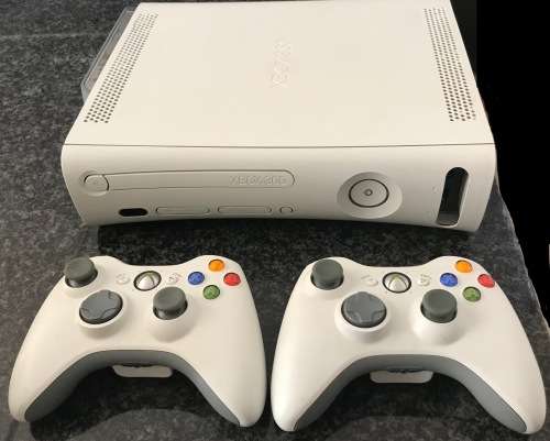 Xbox 360, 120GB HDD, in mint condition, with 2 controllers and 11 games.