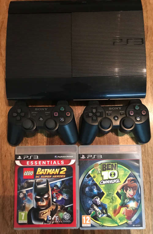 Sony Playstation 3, Black, with 2 original wireless controllers and 2 games, in mint condition.
