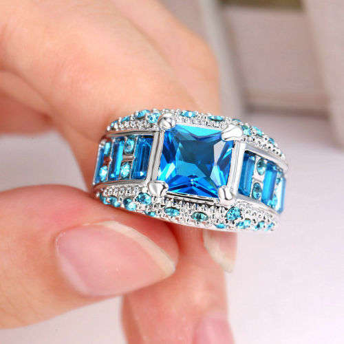 Elegant Rhodium Topaz Rings