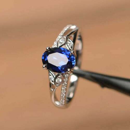 Delicate Silver Royal Blue Sapphire Oval and Leaf Ring
