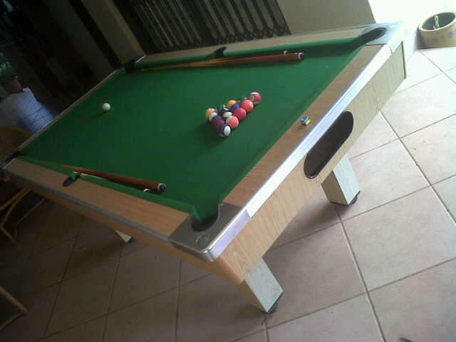 Pool Table including 2 cues , balls and pool table cover