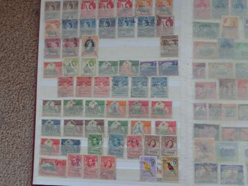 Stamp Album  with over 1000  Mint/Used Mostly  BRITISH Commonwealth and Other World Stamps