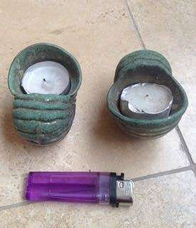 pair of brass shell candle holders