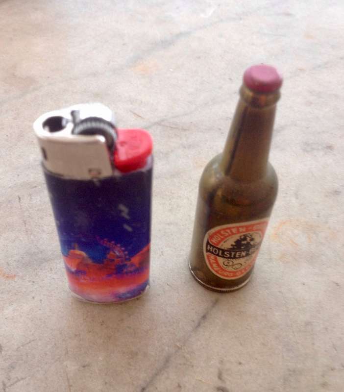 miniature vintage holstens beer bottle wick and flint lighter , made in Germany