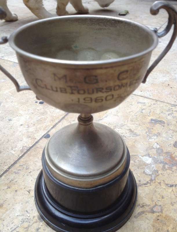 3 vintage trophies , 1948 , 1955 and 1960