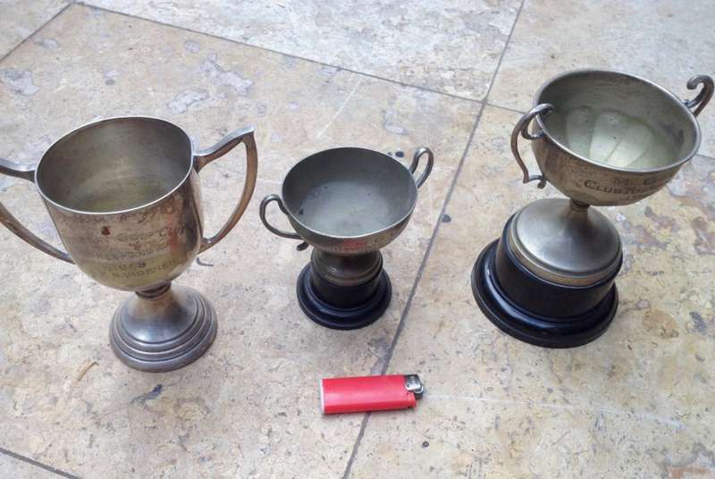 3 vintage trophies , 1948 , 1955 and 1960