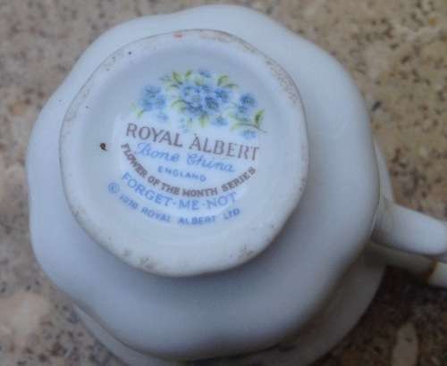 Royal Albert miniature teacup and saucer , flower of the month , July