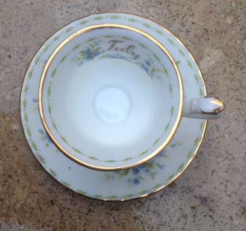 Royal Albert miniature teacup and saucer , flower of the month , July