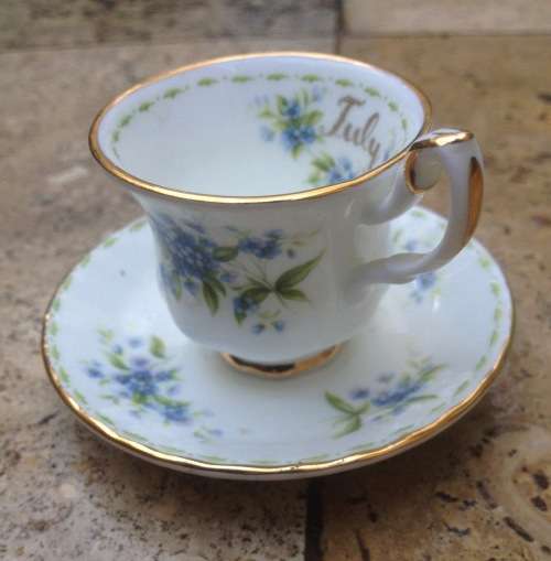 Royal Albert miniature teacup and saucer , flower of the month , July