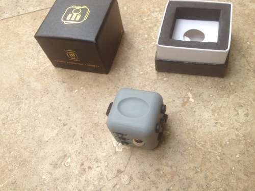 fidget stress cube toy , grey and black boxed