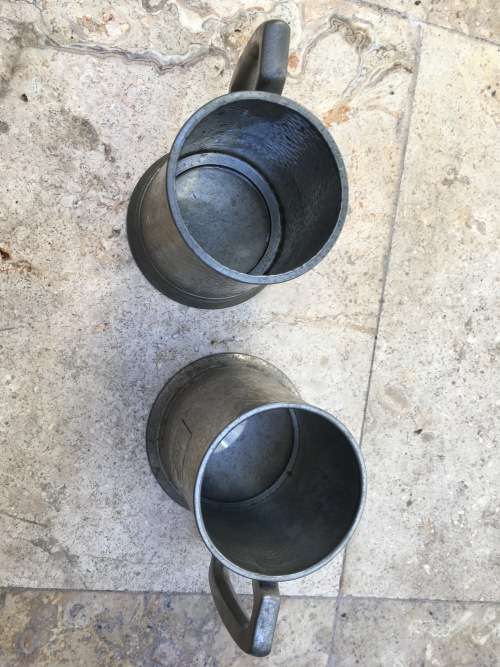 vintage pewter beer mug pair , glass bottom