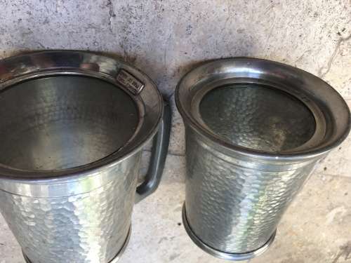 vintage pewter beer mug pair , glass bottom