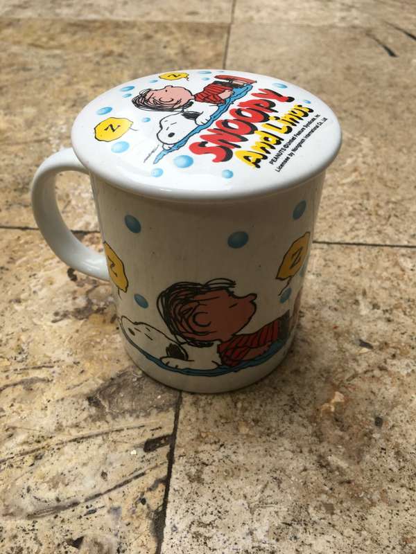 snoopy and Linos coffee cup and lid , peanuts