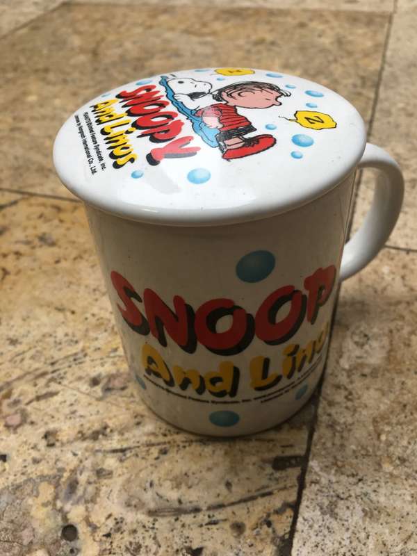 snoopy and Linos coffee cup and lid , peanuts