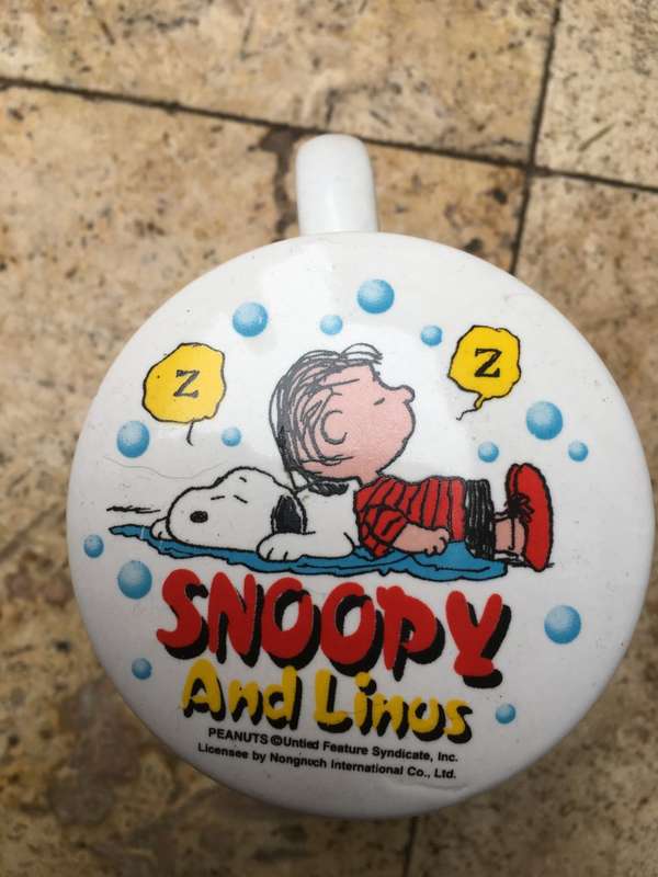 snoopy and Linos coffee cup and lid , peanuts