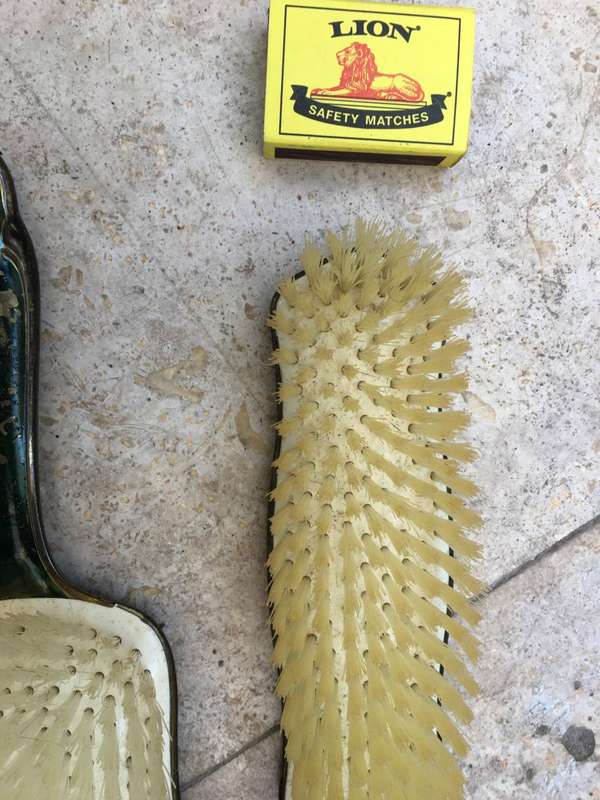 vintage clothes hair brush pair , brass handled , hand painted