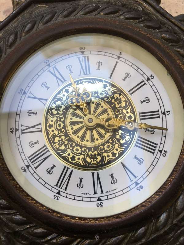 vintage  brass ornate mantle clock , clock needs tlc