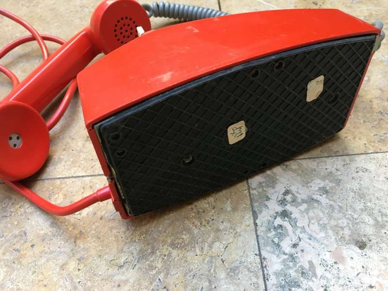 vintage red retro rotary dial up telephone
