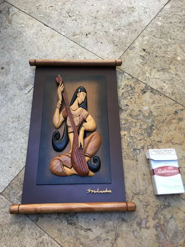 Sri Lanken wood carved wall hanging , woman playing instrument