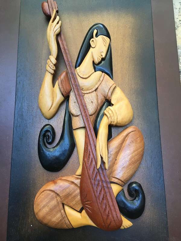 Sri Lanken wood carved wall hanging , woman playing instrument