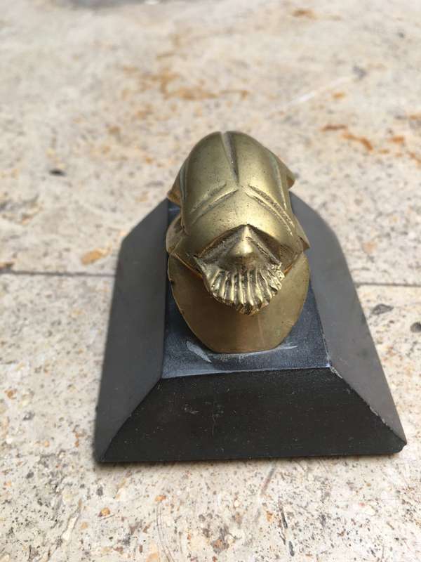 vintage brass scarab on base