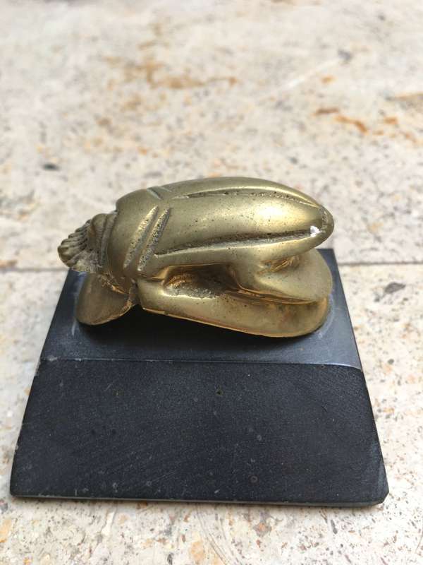 vintage brass scarab on base