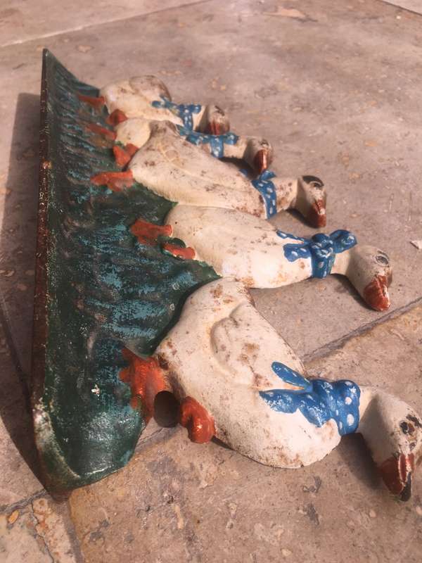 vintage cast iron metal door stop duck family
