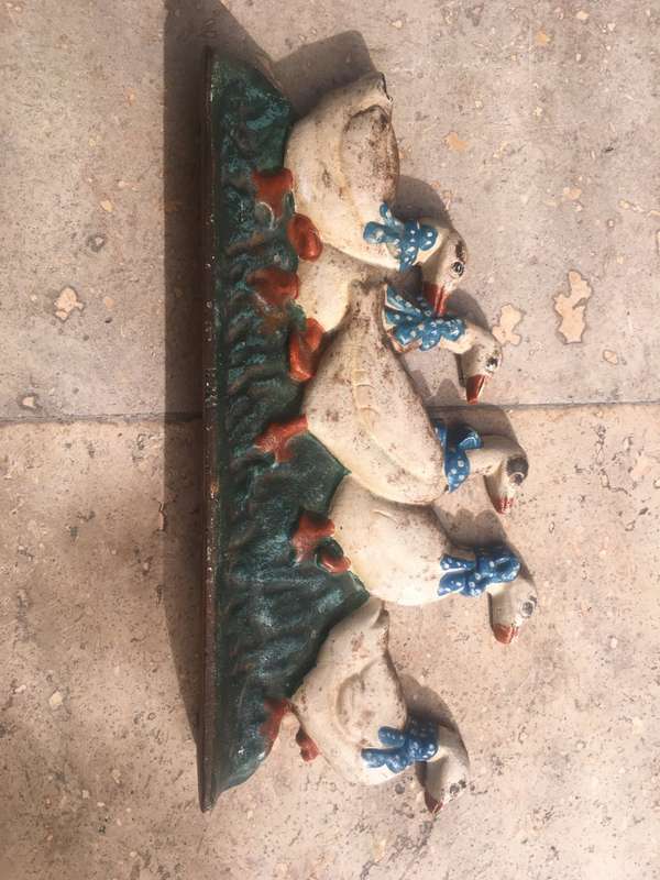 vintage cast iron metal door stop duck family